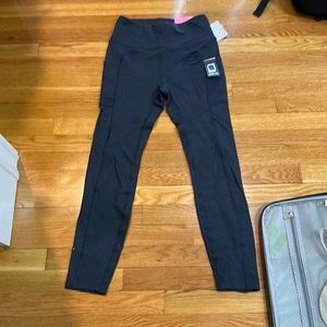 Leggings by X by Gottex. color - caviar. Its a size small